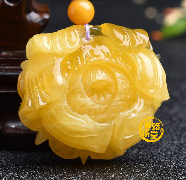 蜜蜡莲花有什么寓意？女生戴这种手串好吗？