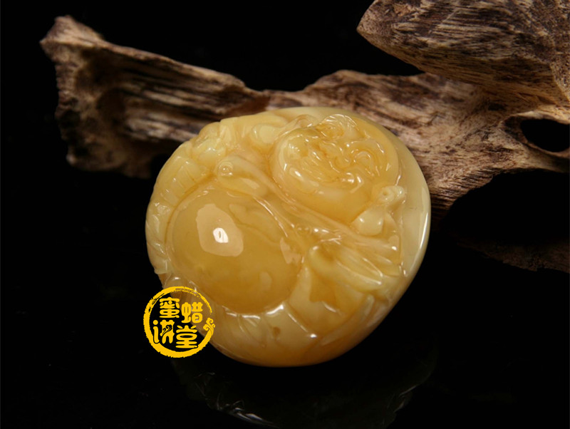 蜜蜡笑佛寓意的是什么？