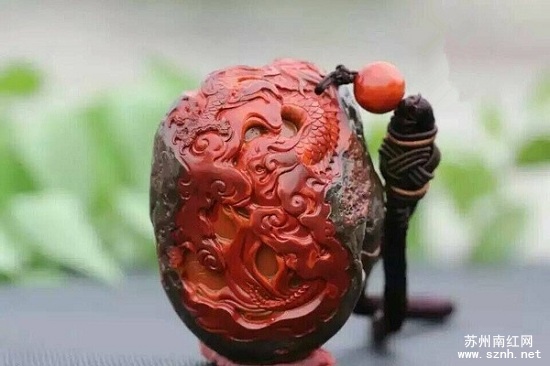 南红玛瑙包浆原石雕件为何大受欢迎?